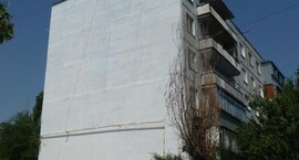 Теплоизоляция торца панельного многоэтажного дома Астратеком