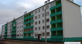 Теплоизоляция фасада многоэтажного дома в Волжском покрытием Астратек